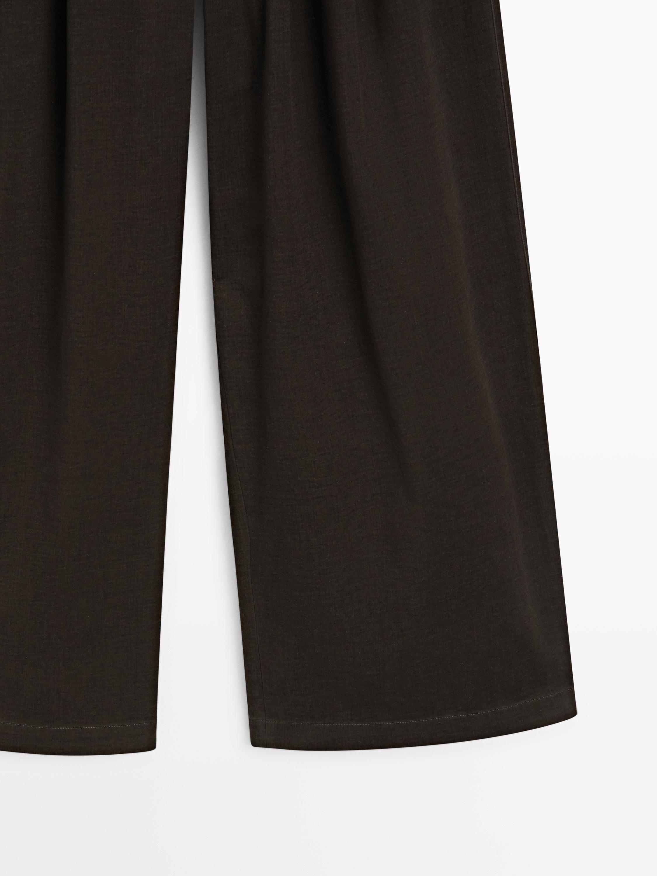 Wide-leg trousers with darts